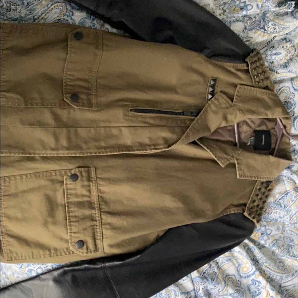 Black and army green studded jacket